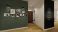 Przedpokój i korytarz z siedziskiem i jedną ścianą pomalowaną farbą tablicową