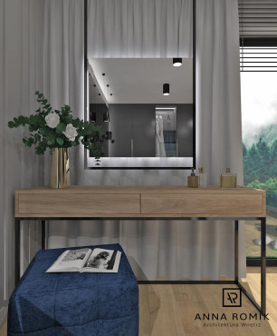 Sypialnia z nowoczesną drewnianą toaletką i kwadratowym pufem.