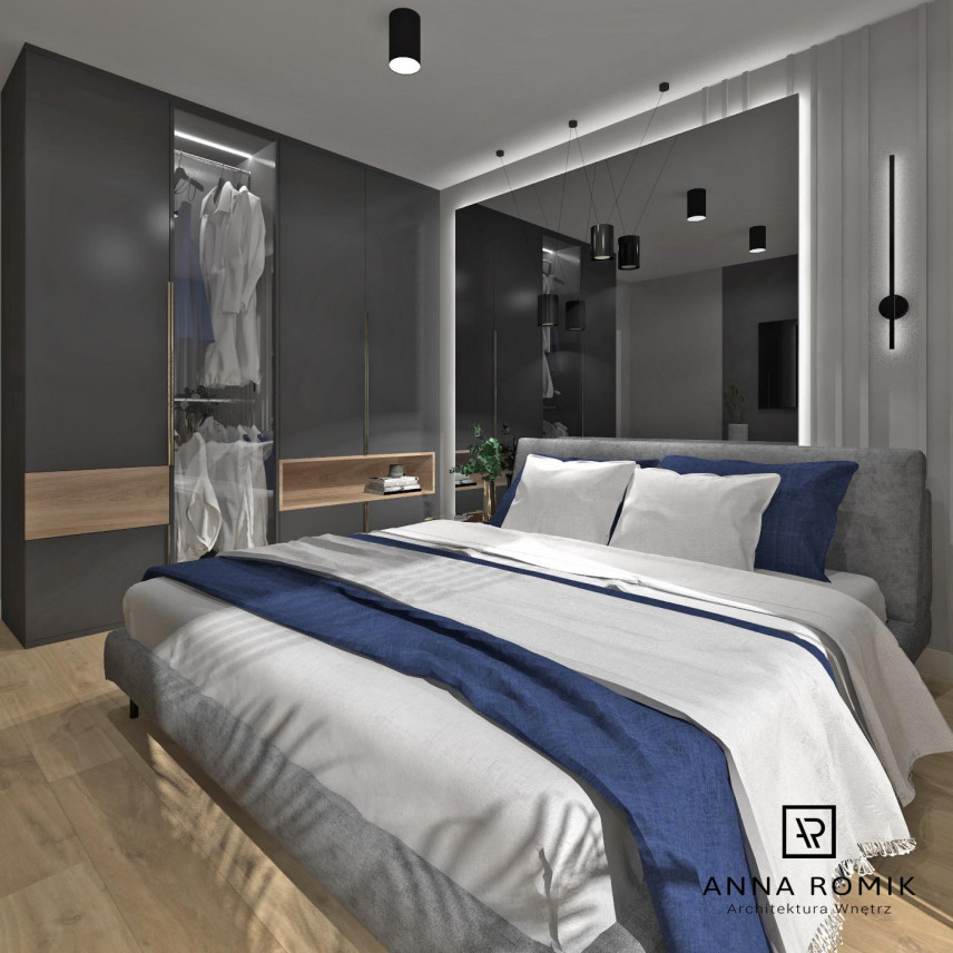 Sypialnia z przeszkloną, dużą szafą i łóżkiem tapicerowanym