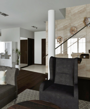 Salon w domu jednorodzinnym ze schodami półkowymi oraz ze szklaną balustradą