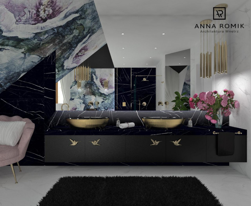 Łazienka na poddaszu z dużym prostokątnym lustrem, szafka wiszącą, fotelem, umywalką i złota lampą