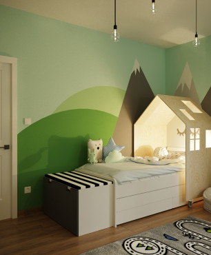 Przytulny pokój dziecięcy z namalowanym krajobrazem na ścianie