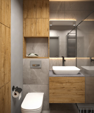 Mała łazienka z prysznicem oraz z drewnianą szafką wiszącą z kamiennym blatem