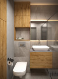 Łazienka z szarymi płytkami na ścianie i podłodze oraz z meblami z drewnianym frontem
