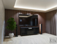 Salon z telewizorem na drewnianej ścianie