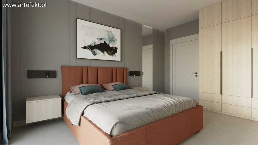 Klasyczna sypialnia z dużym łóżkiem kontynentalnym w kolorze toffi