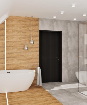 Duża łazienka na poddaszu z wanną wolnostojąca oraz prysznicem z przesuwanymi drzwiami