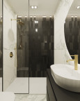 Łazienka w biało-czarnej odsłonie z prysznicem i złotą armaturą łazienkową