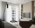 Salon w mieszkaniu w bloku z telewizorem montowanym do ściany