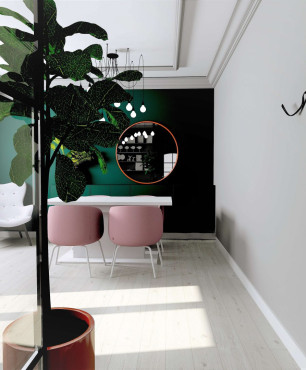 Gabinet biurowy z różowymi, tapicerowanymi krzesłami i zieloną ścianą