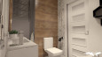 Łazienka z brązowymi i białymi płytkami na ścianie
