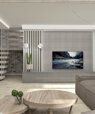 Duży salon z betonem architektonicznym na ściance telewizyjnej