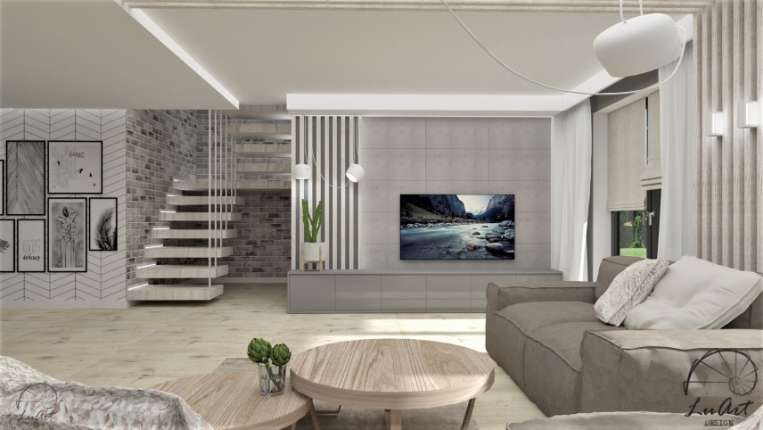 Duży salon z betonem architektonicznym na ściance telewizyjnej