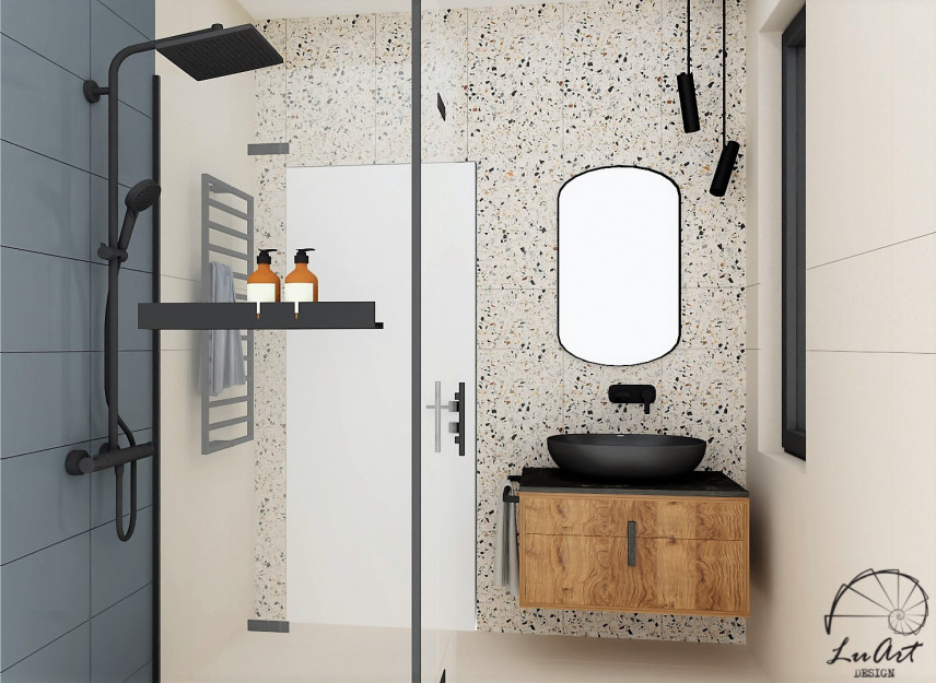 Łazienka z prysznicem oraz płytkami lastryko na jednej ze ścian