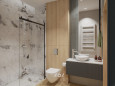 Łazienka z prysznicem walk-in z białymi płytkami gresowymi na ścianie