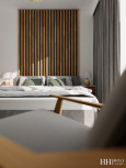 Sypialnia z białym kolorem ścian oraz lamelem drewnianym
