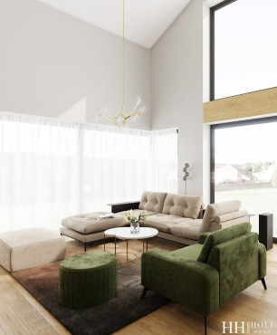 Słoneczny salon z dużymi oknami oraz z tapicerowanym wypoczynkiem
