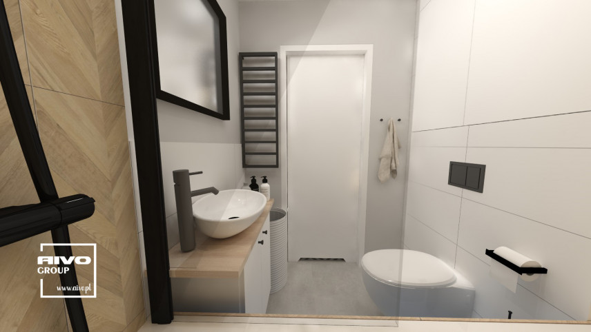 Mała łazienka z prostokątnym lustrem w czarnym obramowaniu