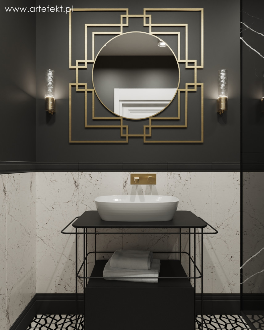 Biało-czarna łazienka ze złotymi dodatkami