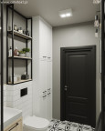 Łazienka z białymi meblami oraz biało-czarną podłogą