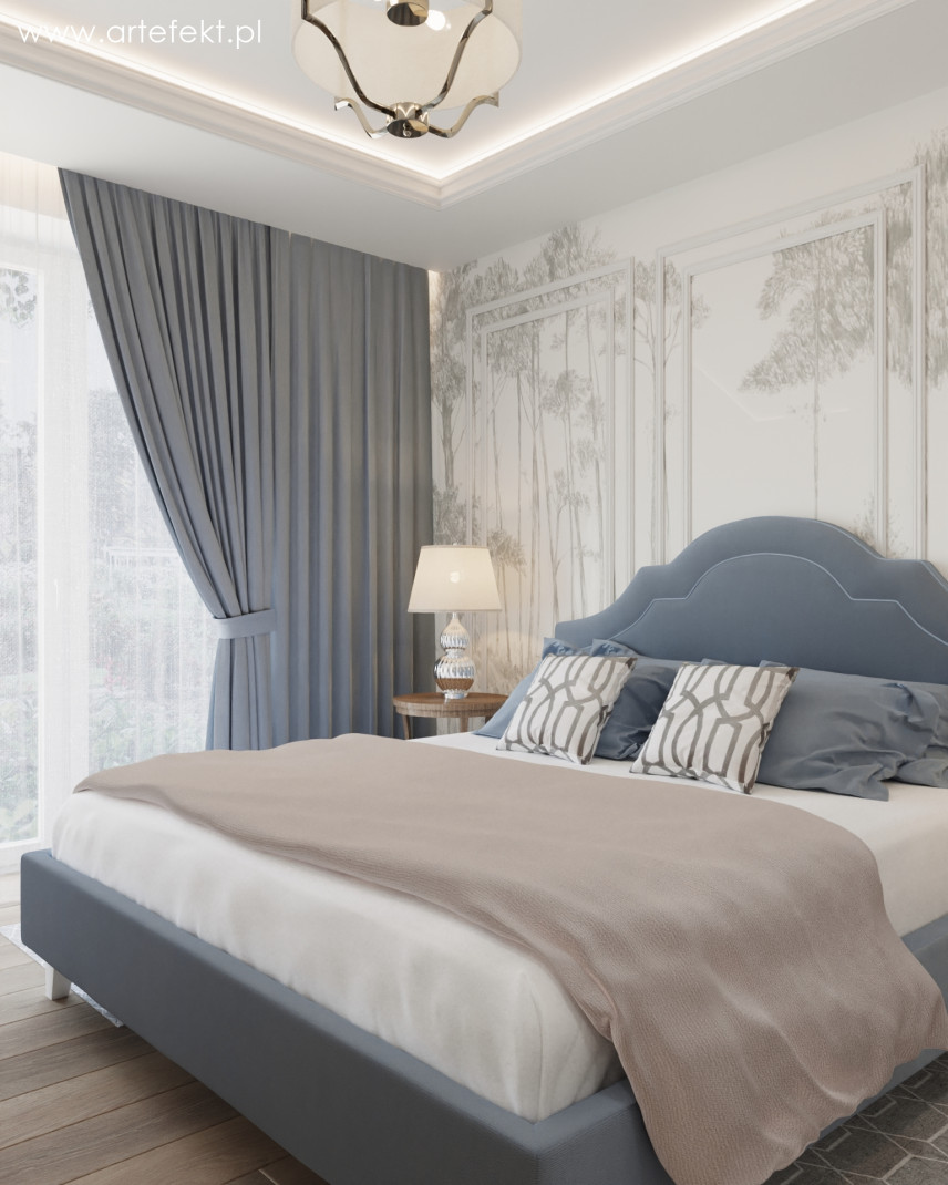 Sypialnia z tapicerowanym łóżkiem w kolorze błękitnym