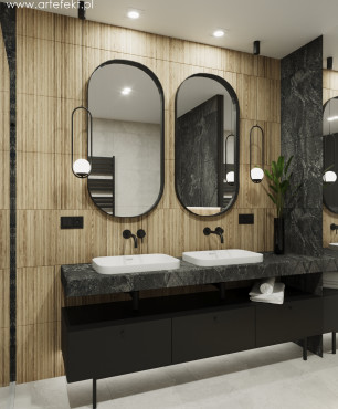 Łazienka z imitacją drewnianych płytek na ścianie oraz z czarną szafką stojącą