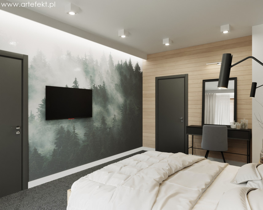 Mała sypialnia z tapetą i telewizorem na ścianie