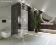 Duża łazienka z prysznicem, białą muszlą wiszącą oraz kamiennymi płytkami, wielkoformatowymi  na podłodze i ścianie