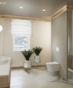 Modna łazienka z kamieniem na ścianie i podłodze oraz szafką wiszącą z białym blatem roboczym