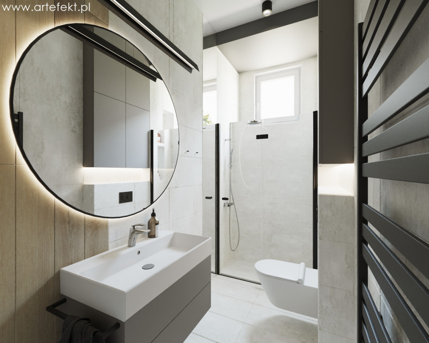 Łazienka z prysznicem oraz szarymi i drewnianymi płytkami na podłodze i ścianie
