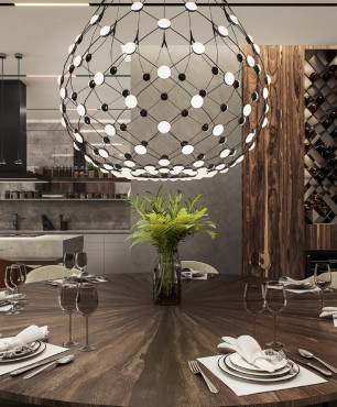 Szykowna jadalnia z dużym, drewnianym, okrągłym stołem oraz designerską lampą okrągłą