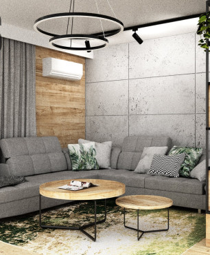 Salon z ozdobnym betonem na ścianie, przeplatane przez drewno