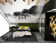 Sypialnia na poddaszu z łóżkiem kontynentalnym oraz czarno-białą tapetą na ścianie