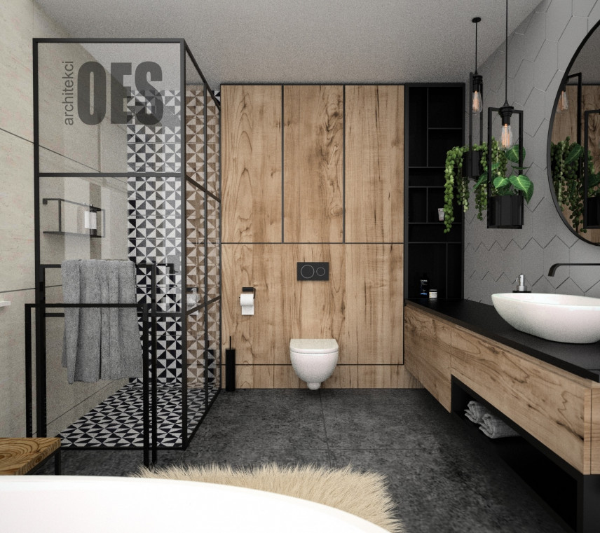 Projekt łazienki z prysznicem oraz szarymi, wielkoformatowymi płytkami na podłodze
