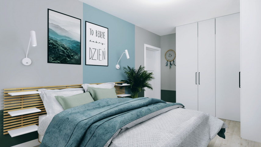 Sypialnia z niebieskim kolorem ścian oraz drewnianym łóżkiem kontynentalnym