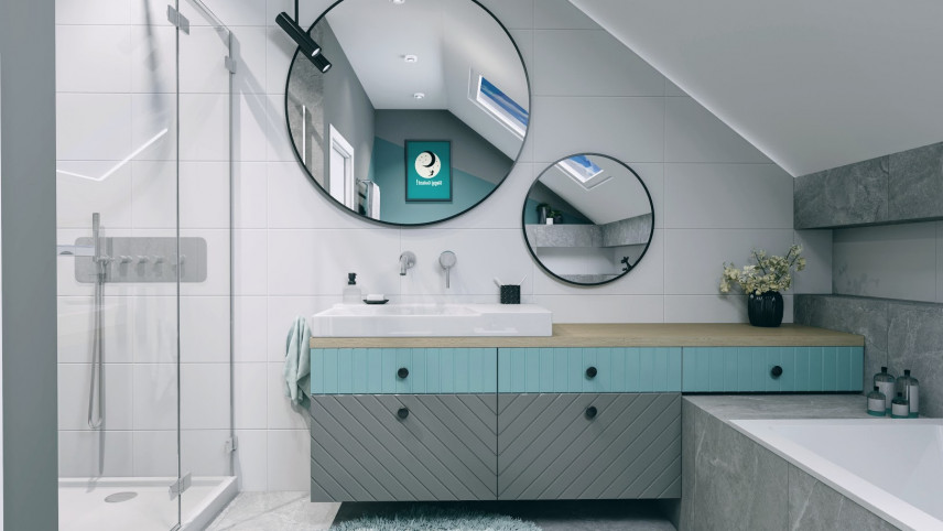 Łazienka na poddaszu z szaro-zieloną szafką wiszącą oraz z prysznicem
