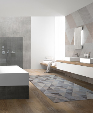 Duża łazienka z wanną wolnostojącą ze ścianami z imitacją betonu