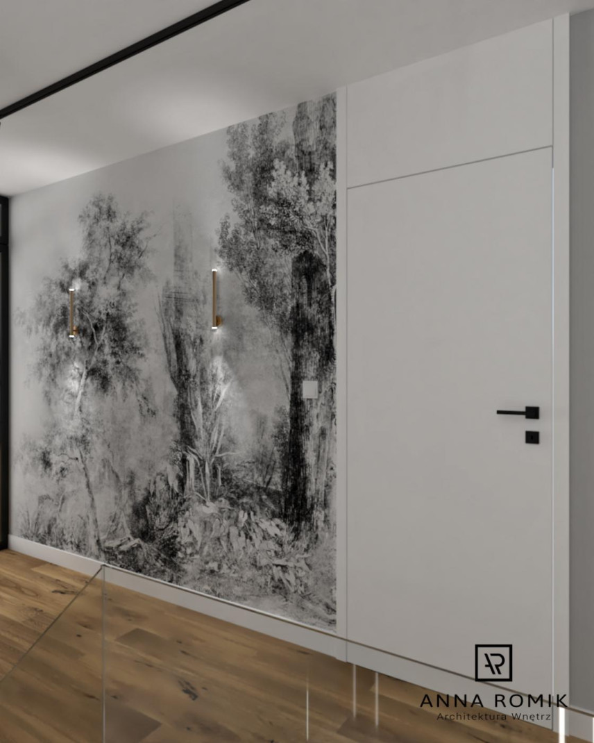 Korytarz z biało-czarną tapetą na ścianie oraz panelami na podłodze w kolorze brązowym