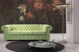 Salon z zieloną sofą