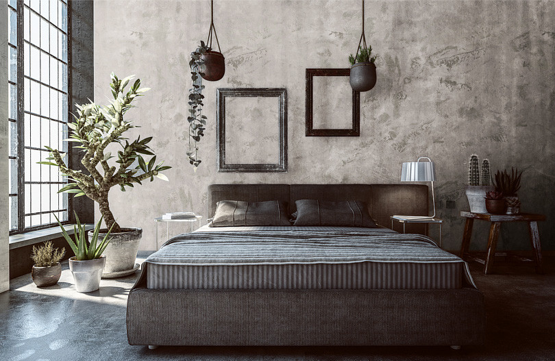 Sypialnia w stylu loft z betonem na ścianie i dużym łóżkiem kontynentalnym