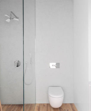 Łazienka z prysznicem walk-in oraz białą muszlą wiszącą