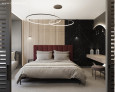 Sypialnia z toaletką oraz drewnem i czarnym marmurem na ścianie