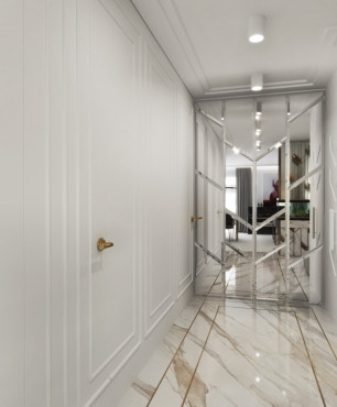 Długi korytarz z dużym, tapicerowanym siedziskiem oraz z marmurową podłogą i pięknymi lustrzanymi drzwiami