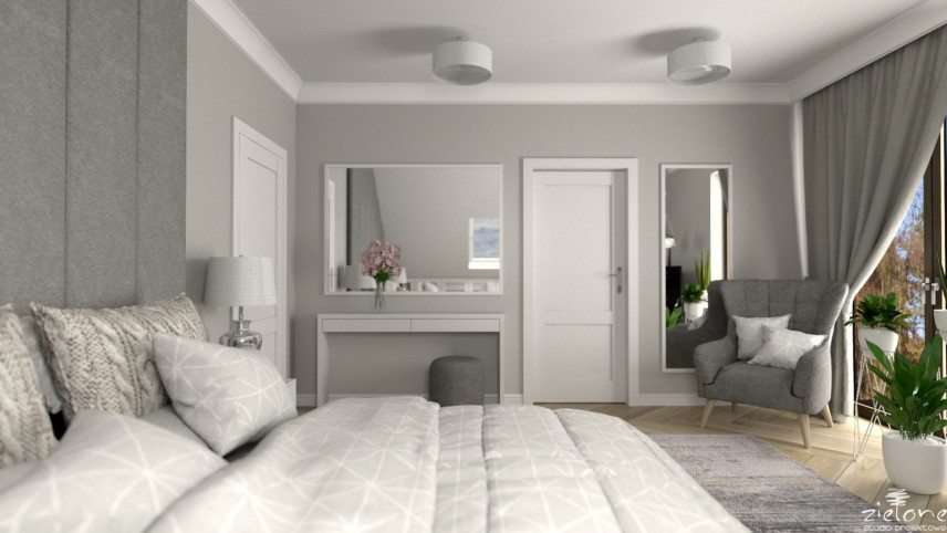 Sypialnia z szarym panelem tapicerowanym na ścianie, szarymi zasłonami oraz szarym kolorem ścian