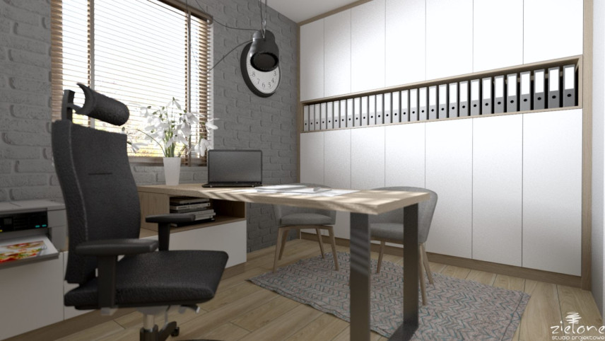 Biuro w domu z szarą cegłą na ścianie, szafą w zabudowie pod sufit oraz biurkiem i krzesłem obracanym