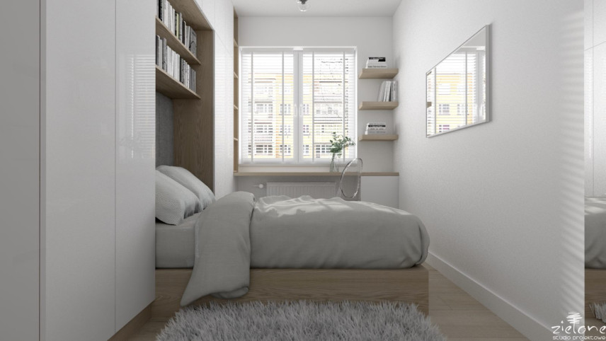 Mała sypialnia w stylu skandynawskim z zabudową nad łóżkiem