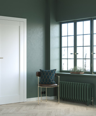Salon z zielonym kolorem ścian oraz białymi drzwiami marki PORTA