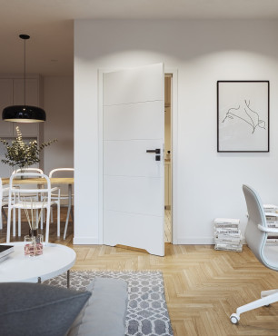 Wnętrze mieszkania w stylu skandynawskim z drewnianym parkietem oraz białymi drzwiami wewnętrznymi