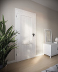 Białe drzwi oraz komoda w salonie