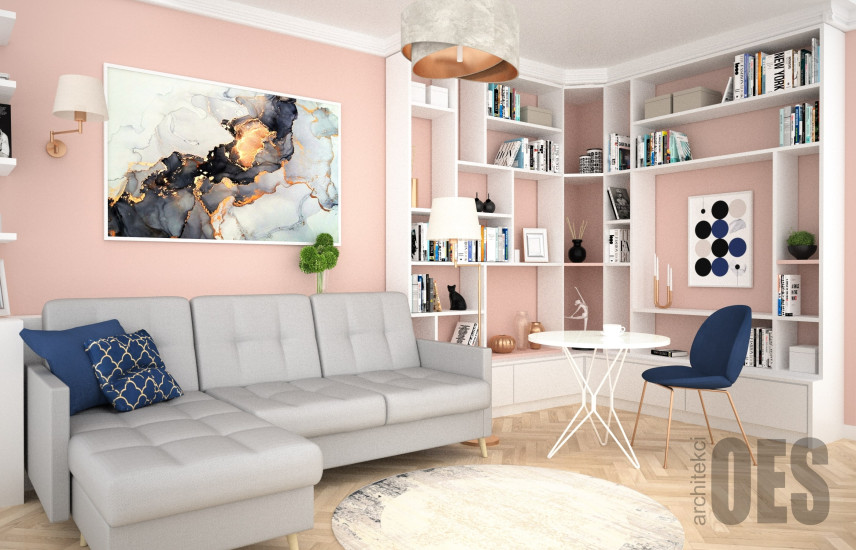 Mały salon w bloku z brzoskwiniowym kolorem na ścianie